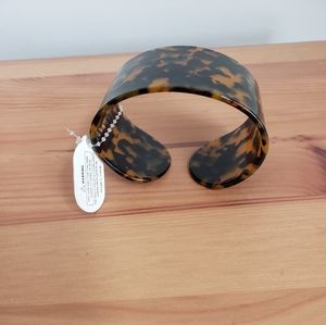 Cuff bracelet.  Tortoise shell pattern.